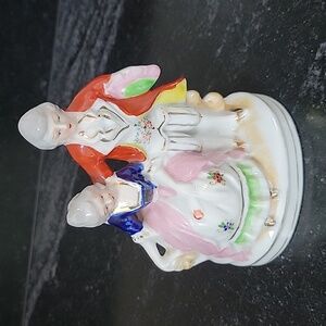 Vintage unoccupied japan. Man and woman porcelain figurine.